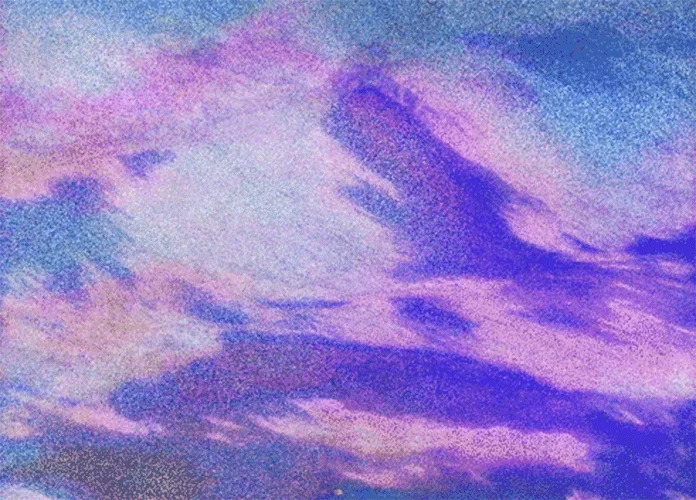 Grainy, textured clouds in pink, violet and blue, like a sky painted in layers.