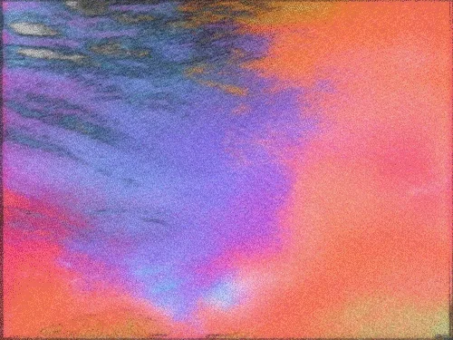 Grainy abstract gradient of orange, pink and purple, streaked as if blurred by motion.